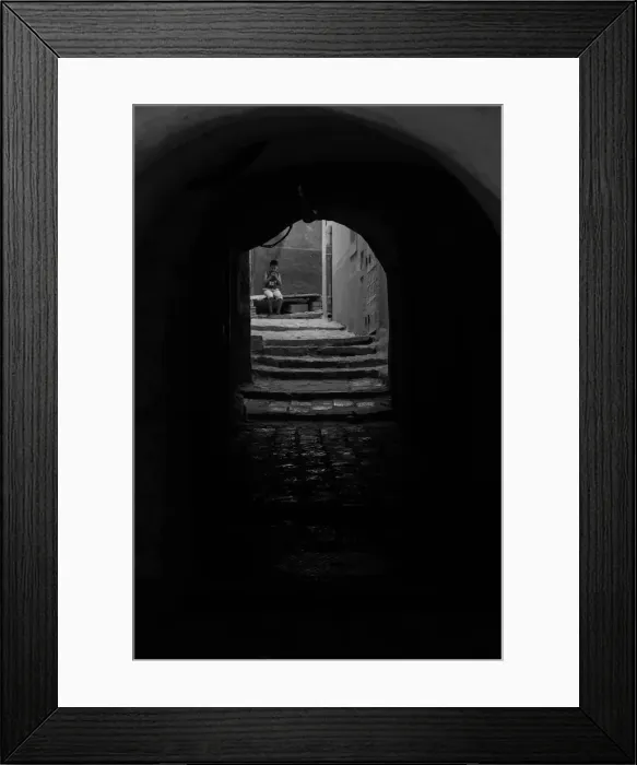 Framed Print : Alone. Child sitting alone in the ancient town of GhardaAOa, Algeria Framed Print : Alone. Child sitting alone in the ancient town of GhardaAOa, Algeria