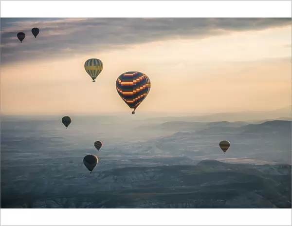 Hot air ballooning in the sunrise in Cappadocia