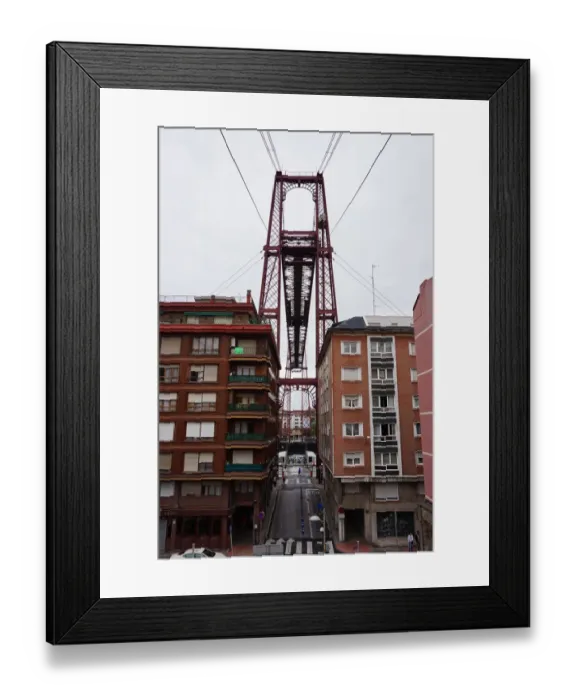 Framed Print : Vizcaya Bridge between houses in Portugalete, Spain Framed Print : Vizcaya Bridge between houses in Portugalete, Spain