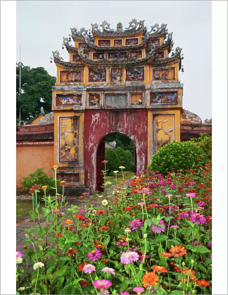 Colorful gate with flowers inside the Hue Citadel