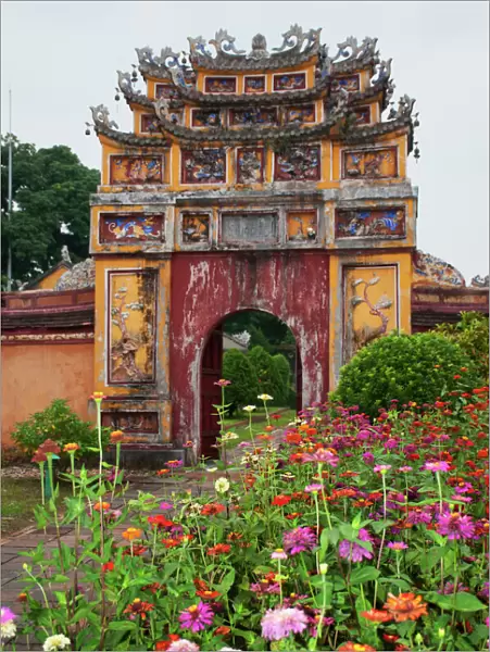 Colorful gate with flowers inside the Hue Citadel