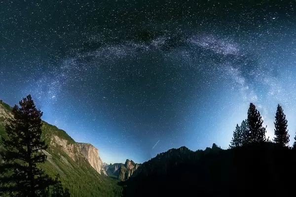 The Milky Way over El Capitan and Half Dome Mountain from Tunnel VIew, Yosemite National Park, California, United States