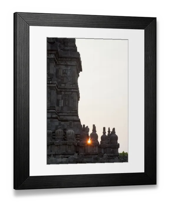 Framed Print : Sun setting through a Prambanan temple Framed Print : Sun setting through a Prambanan temple