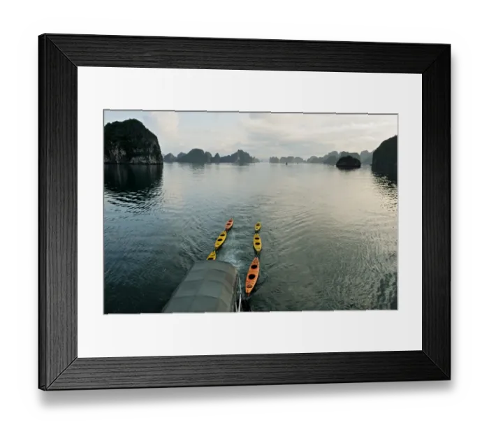 Framed Print : Kayaks pulled by a boat in Bai Tu Long - Ha Long bay - Vietnam