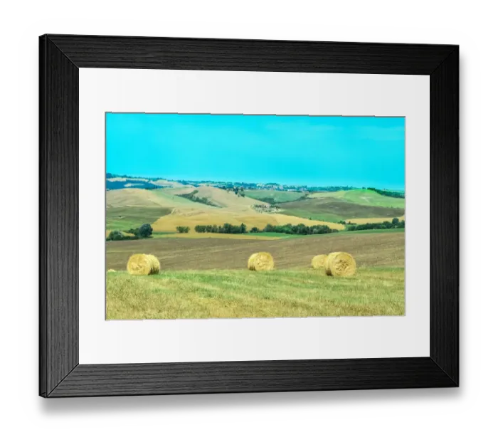 Framed Print : Rolling landscape with haystacks in Val d Orcia Framed Print : Rolling landscape with haystacks in Val d Orcia