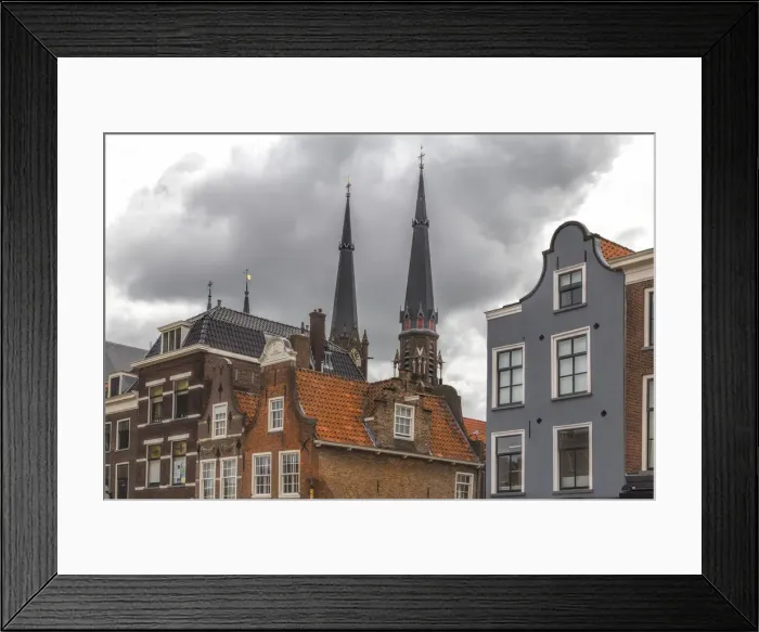 Framed Print : Gabled houses in Delft under a dramatic sky Framed Print : Gabled houses in Delft under a dramatic sky