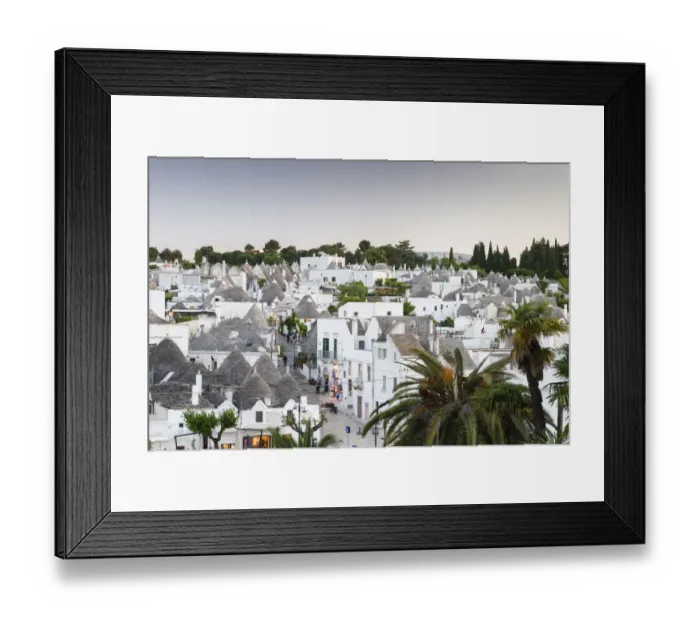 Framed Print : View of the Rione Monti district at dusk, trulli, traditional round houses, trullo settlement, Alberobello, Valle dItria, Trulli Valley, Apulia, Italy Framed Print : View of the Rione Monti district at dusk, trulli, traditional round houses, trullo settlement, Alberobello, Valle dItria, Trulli Valley, Apulia, Italy