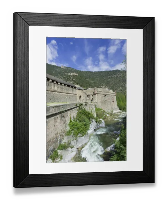 Framed Print : Fortification on the river La Tet, behind Fort Liberia, UNESCO World Heritage Site, Villefranche-de-Conflent, Languedoc-Roussillon, France Framed Print : Fortification on the river La Tet, behind Fort Liberia, UNESCO World Heritage Site, Villefranche-de-Conflent, Languedoc-Roussillon, France