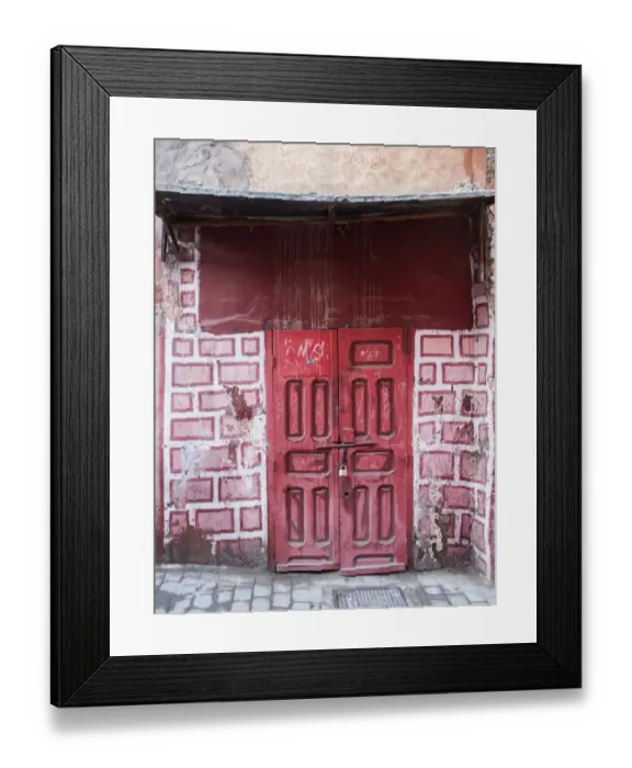 Framed Print : Red door in faux brick wall, Marrakech, Morocco