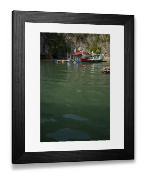 Framed Print : Fishing village in Ha Long Bay, Vietnam Framed Print : Fishing village in Ha Long Bay, Vietnam