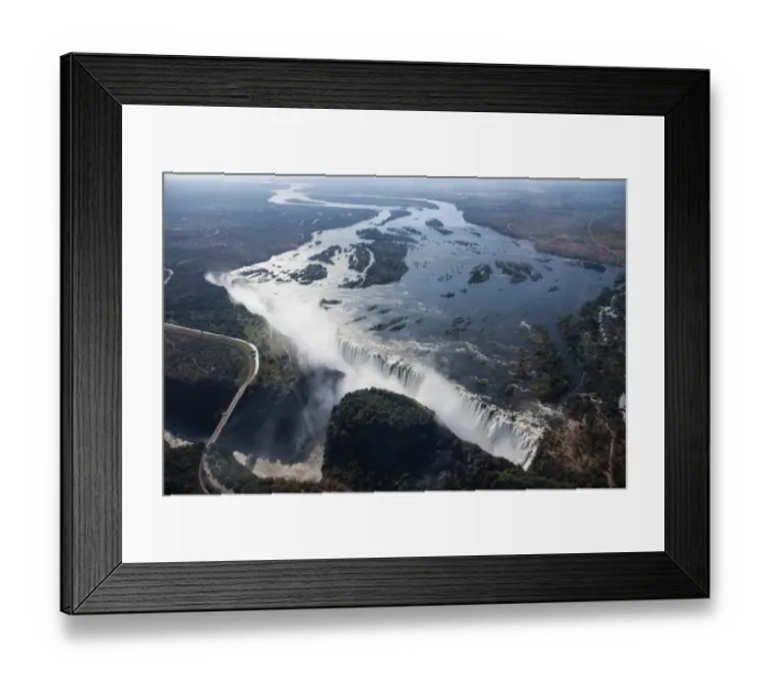 Framed Print : Aerial view, Victoria Falls with the Victoria Falls Bridge over the Zambezi River, Livingstone, Zambia Framed Print : Aerial view, Victoria Falls with the Victoria Falls Bridge over the Zambezi River, Livingstone, Zambia
