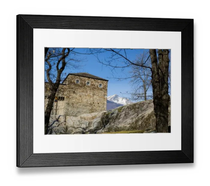 Framed Print : Castle and snow-capped mountains
