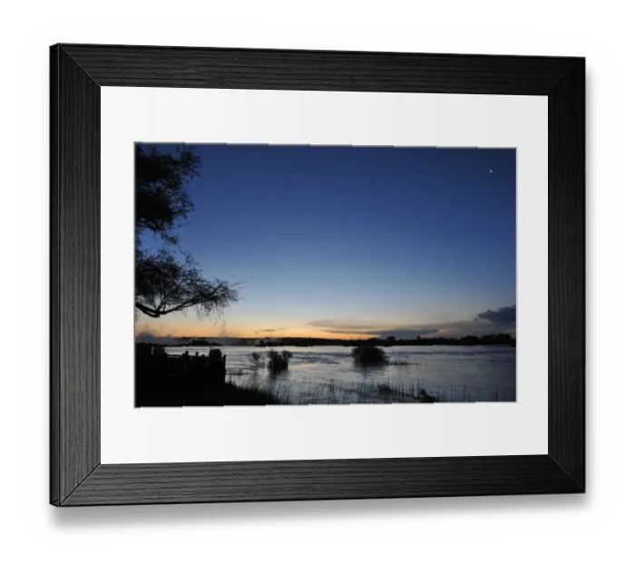 Framed Print : Serene view overlooking The Victoria Falls in Zambia at sunset Framed Print : Serene view overlooking The Victoria Falls in Zambia at sunset