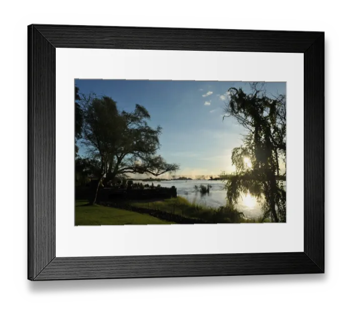 Framed Print : Serene view overlooking The Victoria Falls in Zambia at sunset Framed Print : Serene view overlooking The Victoria Falls in Zambia at sunset