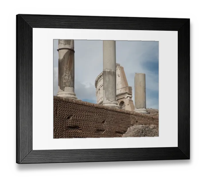 Framed Print : Roman columns, Colosseum in background Framed Print : Roman columns, Colosseum in background