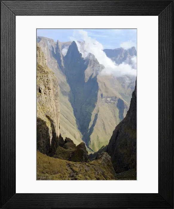 Framed Print : Mountain Pass with sharp peak and low lying cloud in background, Mweni, Drakensberg, Kwazulu Natal, South Africa Framed Print : Mountain Pass with sharp peak and low lying cloud in background, Mweni, Drakensberg, Kwazulu Natal, South Africa