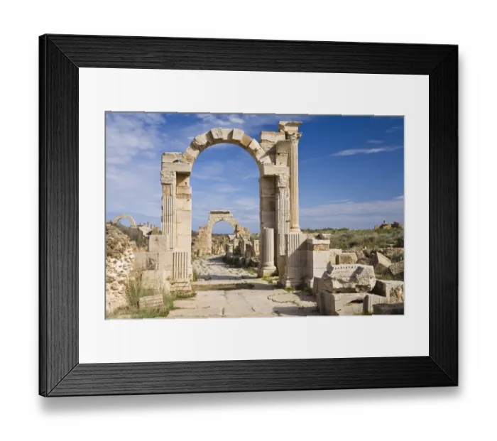 Framed Print : Arch of Trajan on Via Trionfale, Arch of Tiberius in the back, Leptis Magna, Libya, North Africa Framed Print : Arch of Trajan on Via Trionfale, Arch of Tiberius in the back, Leptis Magna, Libya, North Africa