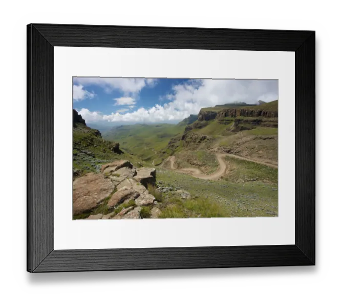 Framed Print : A scenic view of the a trail through the hills of the Sani Pass, Drakensberg Park, KwaZulu-Natal, South Africa