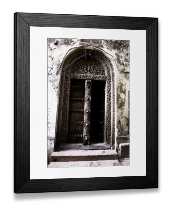Framed Print : Carved wooden doors in Stone Town