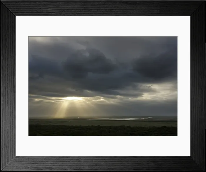 Framed Print : Sunbeams breaking through a dark cloudy over a wetland, iSimangaliso Wetland Park, Kwazulu-Natal, South Africa Framed Print : Sunbeams breaking through a dark cloudy over a wetland, iSimangaliso Wetland Park, Kwazulu-Natal, South Africa