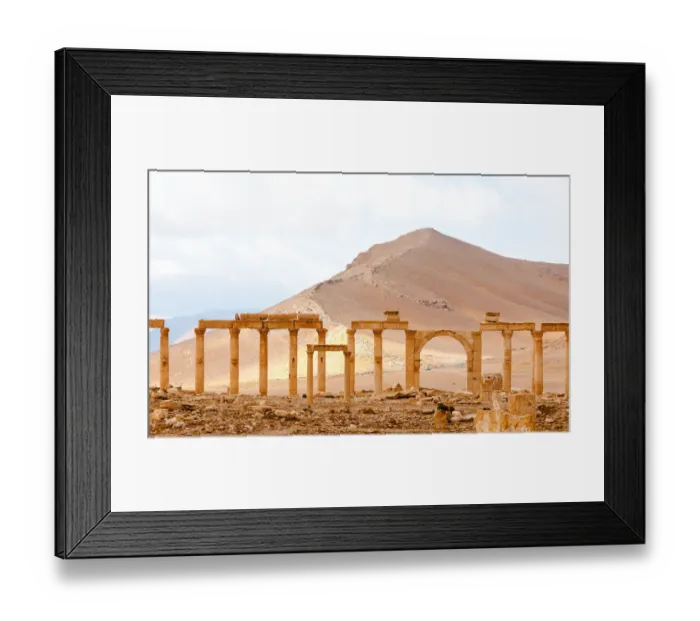 Framed Print : Palmyra arches against desert dunes Framed Print : Palmyra arches against desert dunes