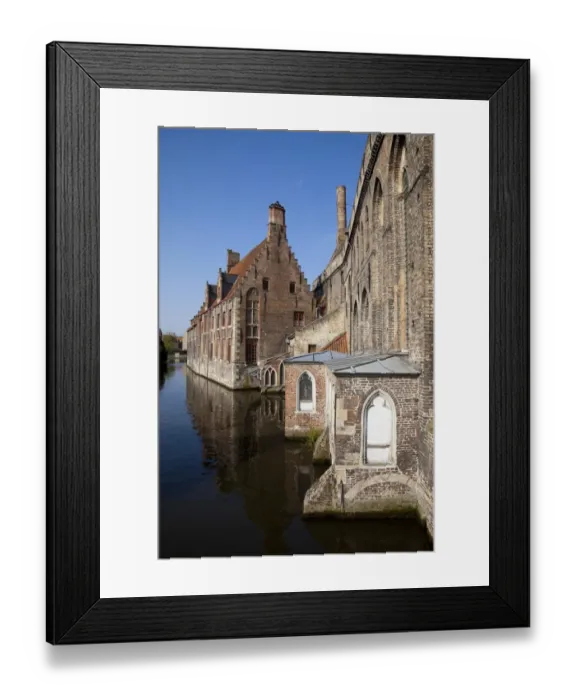 Framed Print : Old Buildings in Canal