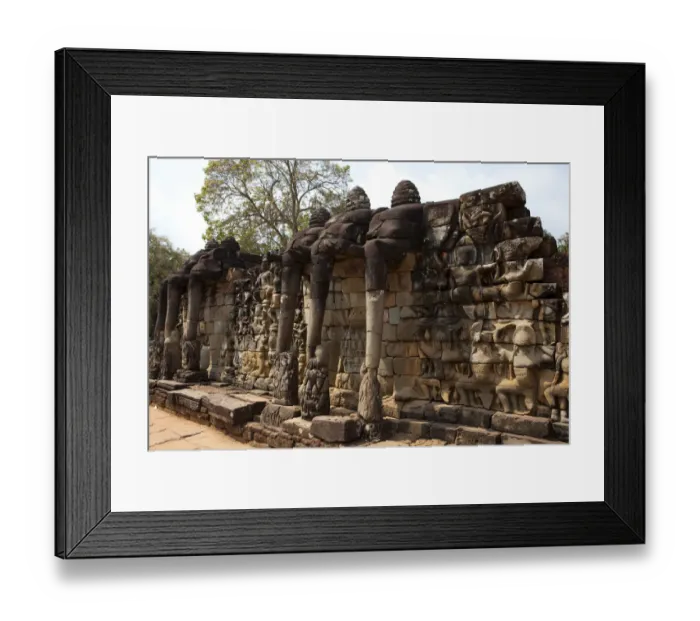 Framed Print : Elephant Statues on Wall