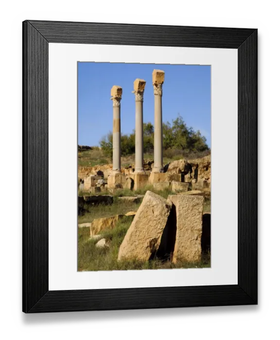 Framed Print : Columns with corinthian capital, Ruins of the Roman City Leptis Magna, Libya Framed Print : Columns with corinthian capital, Ruins of the Roman City Leptis Magna, Libya