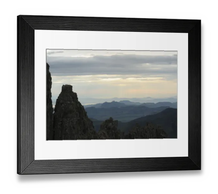 Framed Print : Ridge of rock framing mountains and clouds in the distance, Royal Natal, Drakensberg uKhahlamba National Park, Kwazulu-Natal, South Africa Framed Print : Ridge of rock framing mountains and clouds in the distance, Royal Natal, Drakensberg uKhahlamba National Park, Kwazulu-Natal, South Africa