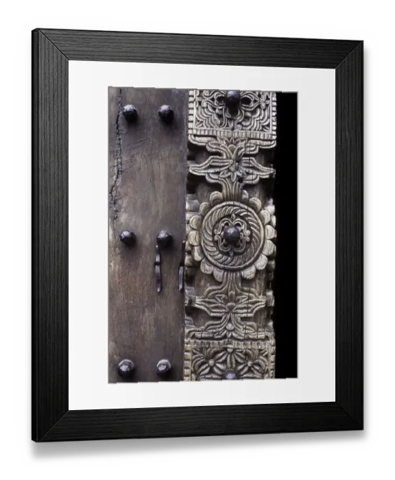 Framed Print : Carved wooden doors in Stone Town