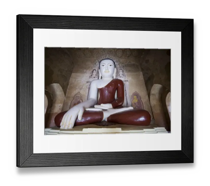 Framed Print : Sitting Buddha colored statue on a temple Framed Print : Sitting Buddha colored statue on a temple