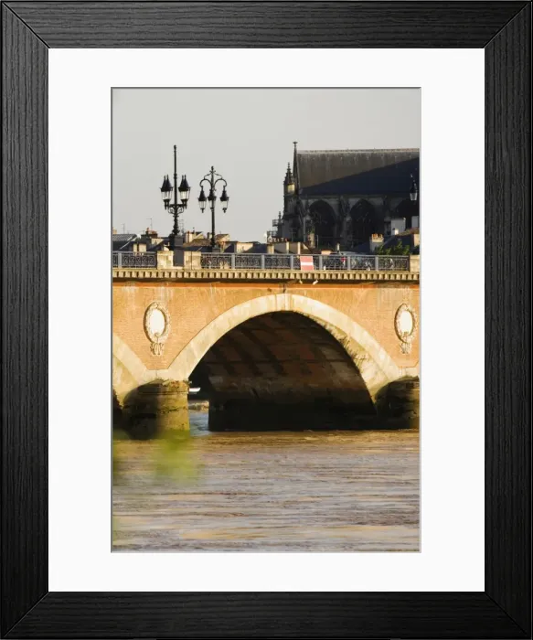 Framed Print : Arch bridge across a river, Pont De Pierre, St. Michel Basilica, Garonne River, Bordeaux, Aquitaine, France