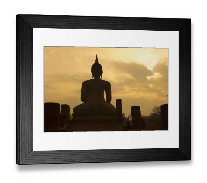 Framed Print : Silhouette of buddha statue at sunset, Thailand Framed Print : Silhouette of buddha statue at sunset, Thailand