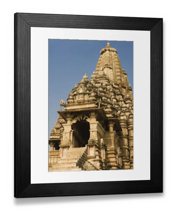 Framed Print : Low angle view of a temple, Kandariya Mahadeva Temple, Khajuraho, Chhatarpur District, Madhya Pradesh, India Framed Print : Low angle view of a temple, Kandariya Mahadeva Temple, Khajuraho, Chhatarpur District, Madhya Pradesh, India
