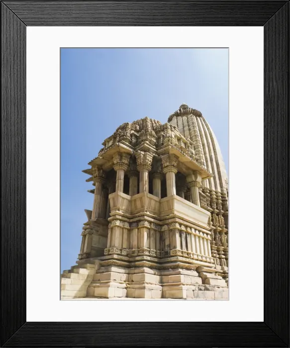 Framed Print : Low angle view of a temple, Kandariya Mahadeva Temple, Khajuraho, Chhatarpur District, Madhya Pradesh, India Framed Print : Low angle view of a temple, Kandariya Mahadeva Temple, Khajuraho, Chhatarpur District, Madhya Pradesh, India