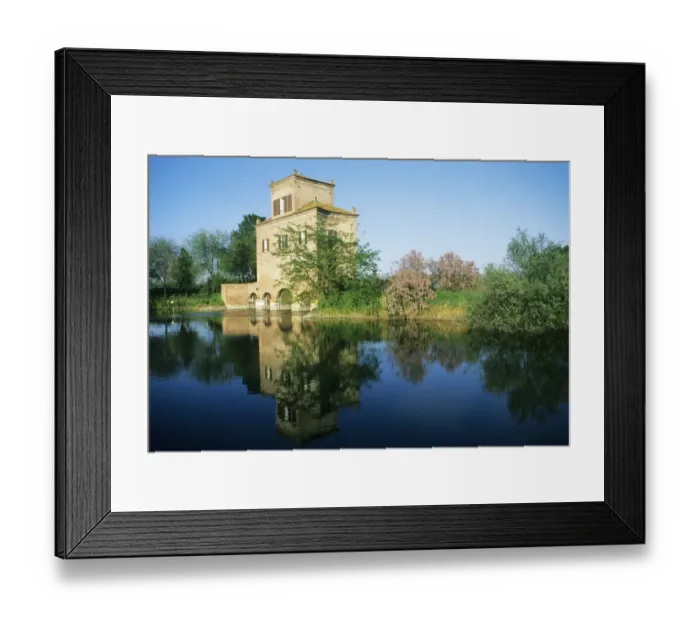 Framed Print : Italy, Emilia Romagna, Delta Del Po Park, Building by pond Framed Print : Italy, Emilia Romagna, Delta Del Po Park, Building by pond
