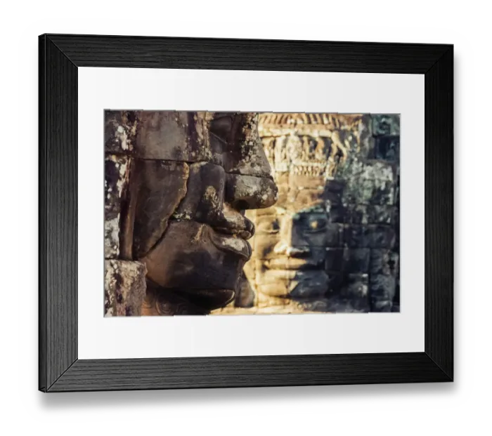 Framed Print : Giant carved stone faces at Bayon temple