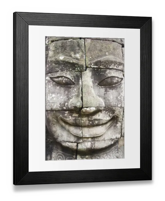 Framed Print : Buddha giant face carved in pillars Bayon Temple