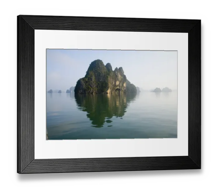 Framed Print : Rocky islands with still water in misty morning Framed Print : Rocky islands with still water in misty morning