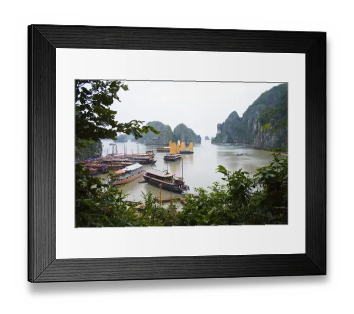 Framed Print : Boats and rocky islands in Vietnamese harbor Framed Print : Boats and rocky islands in Vietnamese harbor