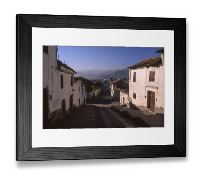 Framed Print : A cobblestone street in Cusco