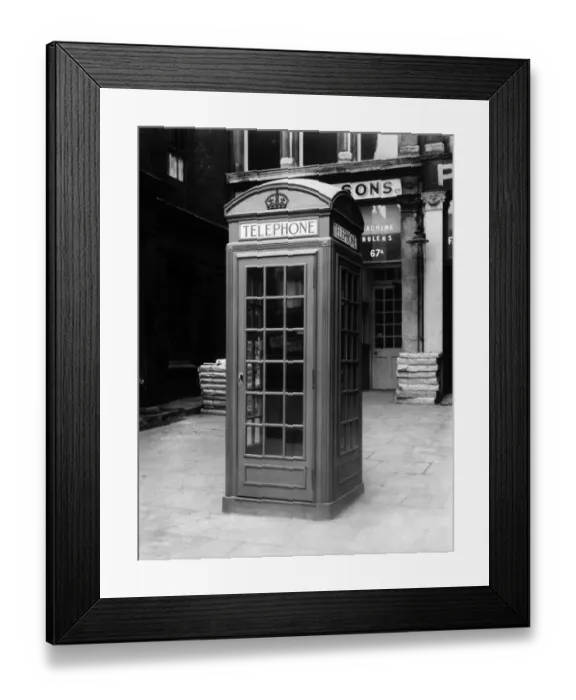 Framed Print : Phone Box. 15th March 1928: A telephone box outside 67A Farringdon Street, London Framed Print : Phone Box. 15th March 1928: A telephone box outside 67A Farringdon Street, London