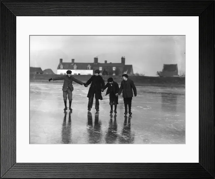Framed Print : Skating. January 1907: Four lads skating hand in hand on the Cowpit Wash, Spalding Framed Print : Skating. January 1907: Four lads skating hand in hand on the Cowpit Wash, Spalding