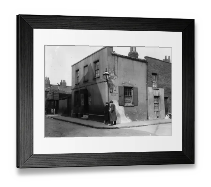 Framed Print : Chinatown. Two Chinese men meet on a street corner in Chinatown in Londons East End Framed Print : Chinatown. Two Chinese men meet on a street corner in Chinatown in Londons East End