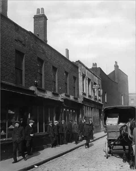 Chinatown. April 1911: A street in Limehouse, Londons Chinatown