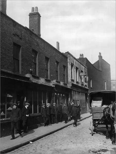 Chinatown. April 1911: A street in Limehouse, Londons Chinatown