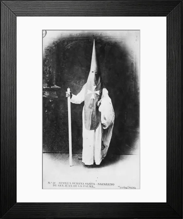 Framed Print : Penitent. January 1903: A priest dressed up for Penitent week in Seville Framed Print : Penitent. January 1903: A priest dressed up for Penitent week in Seville