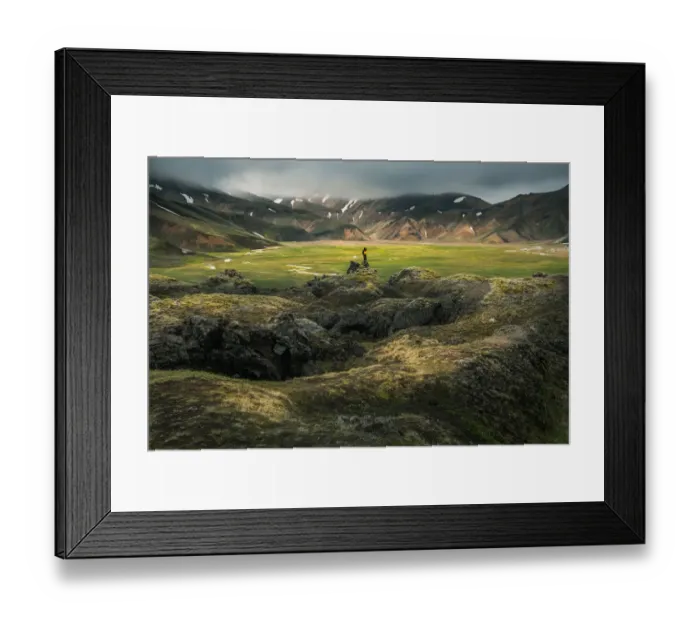Framed Print : A man standing infront of volcanic landscape Framed Print : A man standing infront of volcanic landscape
