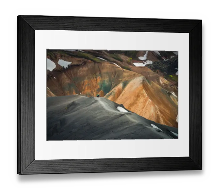 Framed Print : travellers walking at the volcanic landscape of landmannalaugar Framed Print : travellers walking at the volcanic landscape of landmannalaugar