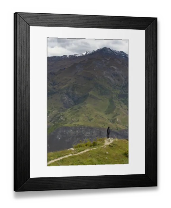 Framed Print : traveller looking at mountain in Queenstown, New Zealand Framed Print : traveller looking at mountain in Queenstown, New Zealand